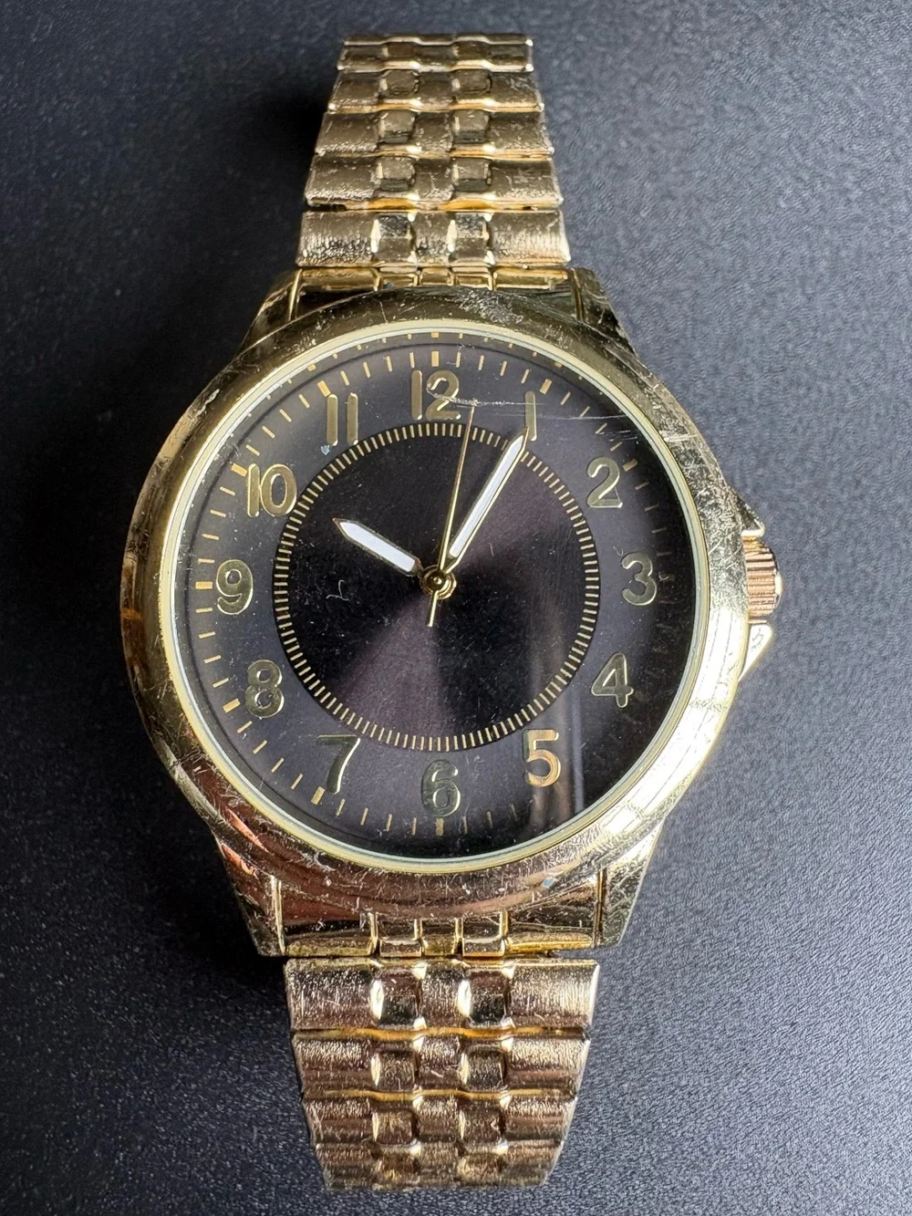 Gold Tone Watch with Black Dial